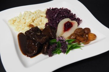 Our plate with venison stew, Spätzli, red cabbage and autumnally accompaniments.